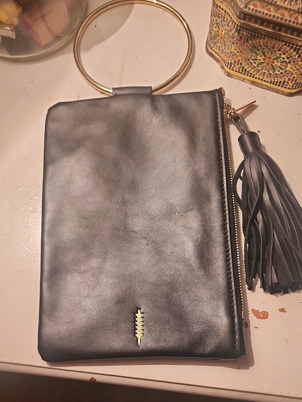 Thacker Black Leather Wristlet Clutch with Gold Ring Handle